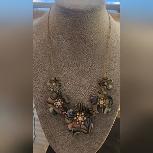 Elegant Floral Necklace with Gold Tone Accents